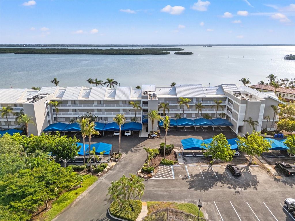 Photo of 615 Dream Island Place #210, Longboat Key, FL 34228 (MLS # TB8395898)