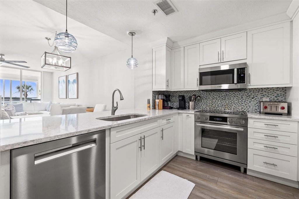 Photo of 615 Dream Island Place #210, Longboat Key, FL 34228 (MLS # TB8395898)