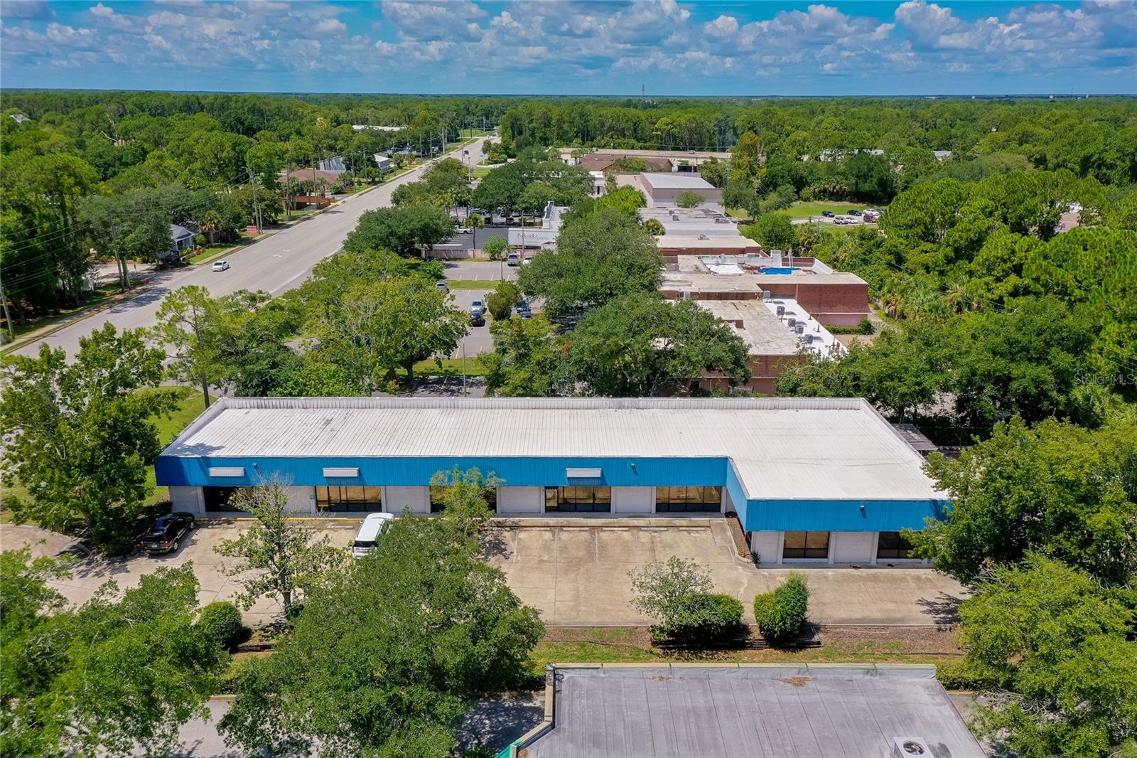 BACK ON MARKET WITH $100,000.00 REDUCTION! Seller motivated! End-user building for retail, medical office, school, or day care. Entire 7,530 sq ft office/retail now becoming available on a main road. Owner financing will be considered. Building is set up for one to three units with separate storefront access and separate utilities. Great retail or medical office location near the hospital and I-95. Hard to find multi-tenant commercial building with lots of flexibility. Brick exterior for easy maintenance. 2023 - new electric panels. 2022 - roof resealed. 2017 - 2020 - a/c units replaced. Well located on major commercial connector within minutes of I-95, I-4, US 92, and LPGA Blvd interchange, near the Daytona International Airport, the Speedway, and Halifax Health Hospital. Large sign and left hand turn lane for easy access. New Assisted Living Center proposed for site across the street, and lots of medical office users in the area. 2023 - new electric panels. 2022 - roof resealed. 2017 - 2020 - a/c units replaced. Well located on major commercial connector within minutes of I-95, I-4, US 92, and LPGA Blvd interchange, near the Daytona International Airport, the Speedway, and Halifax Health Hospital.
