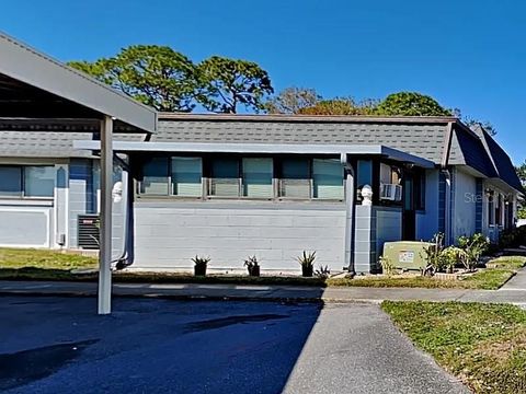Photo of 5115 70th Place N #5115, Pinellas Park, FL 33781 (MLS # O6383139)