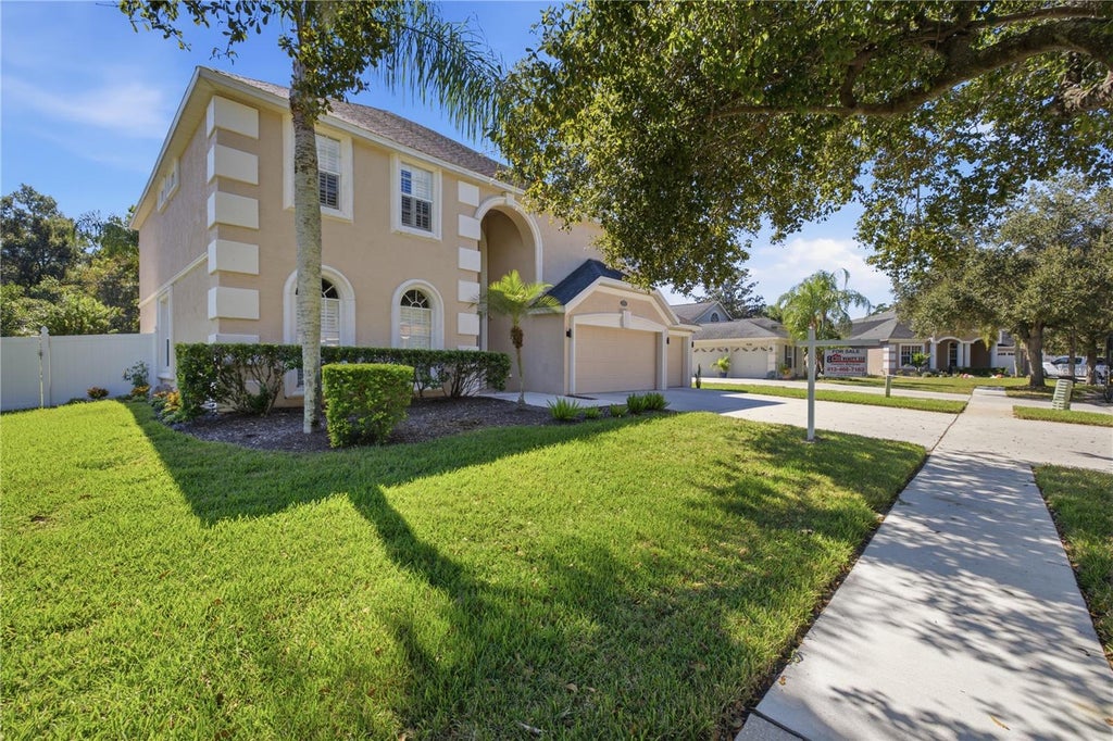 Photo of 9228 Brindlewood Drive, Odessa, FL 33556 (MLS # TB8553691)