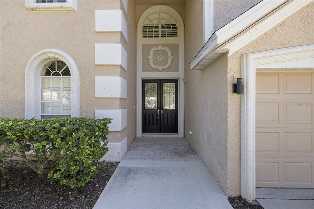 Photo of 9228 Brindlewood Drive, Odessa, FL 33556 (MLS # TB8553691)