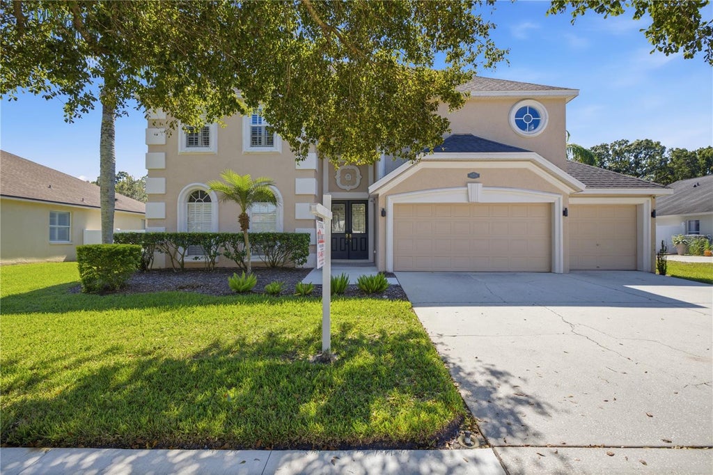 Photo of 9228 Brindlewood Drive, Odessa, FL 33556 (MLS # TB8553691)