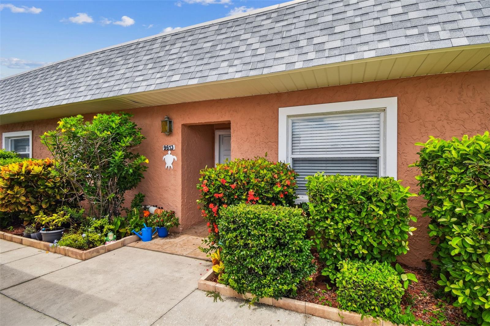 Fully Renovated Golf Course View Condo in a Premier Gated Community! Welcome to your dream home in one of the most desirable gated communities in New Port Richey, Florida! This beautifully renovated 2-bedroom, 2-bath condo offers stunning views of the second hole of the executive golf course and blends modern comfort with luxury resort-style living. Step inside to discover a completely updated and renovated interior, an open-concept and beautiful views of the golf course from the enclosed patio. The kitchen, upgraded bathrooms, large master closet, refinished ceilings, fresh paint and sleek flooring make this home truly move-in ready. Enjoy exclusive access to the private clubhouse and top-tier amenities—including pools, fitness facilities, tennis courts, and social events—membership fees required and optional. Whether you're relaxing on your private screened-in patio overlooking the greens or enjoying the vibrant community lifestyle, this condo is the perfect place to call home. Don't miss this rare opportunity to live in a maintenance-free, golf course community. There is a plethora of retail shopping, dining, restaurants and more within just a couple of miles, the location is unbeatable. Close access to the Veterans Expressway ensures easy access to Tampa and surrounding areas. Schedule your private tour today!