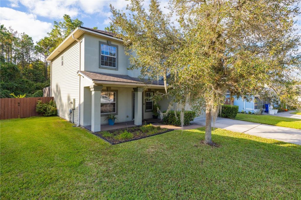 Photo of 415 W New England Drive, Elkton, FL 32033 (MLS # O6356813)