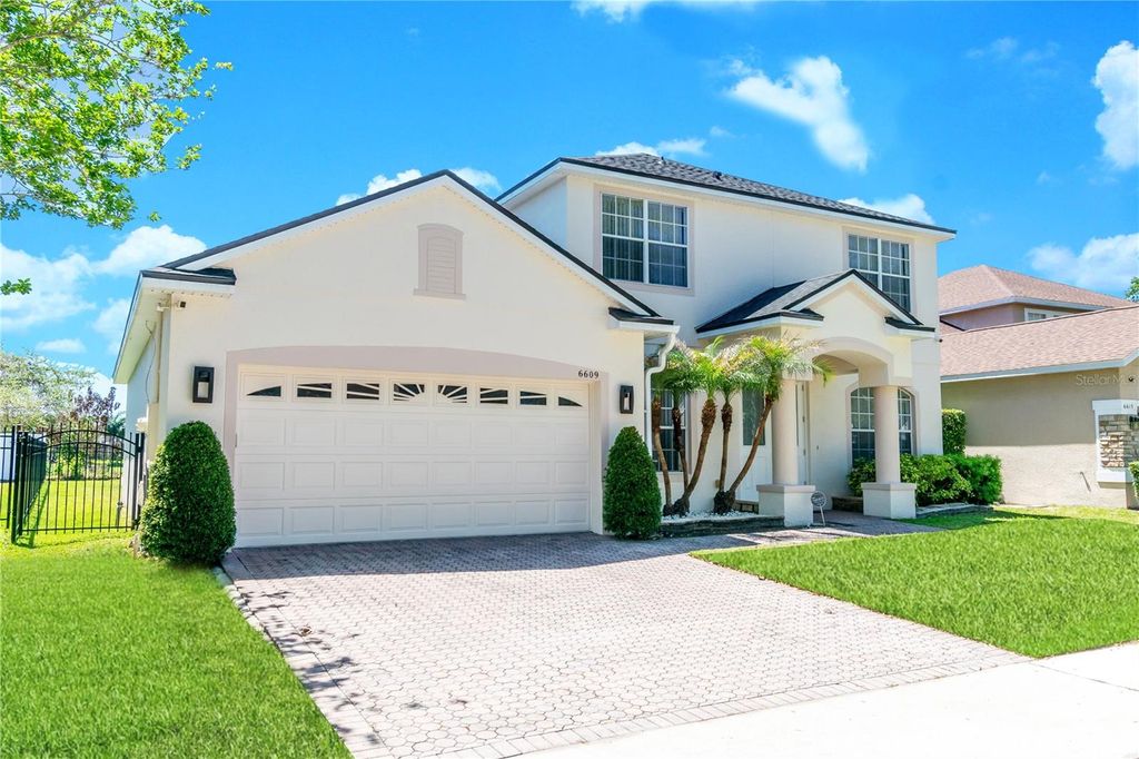 Photo of 6609 Lake Pembroke Place, Orlando, FL 32829 (MLS # S5147996)