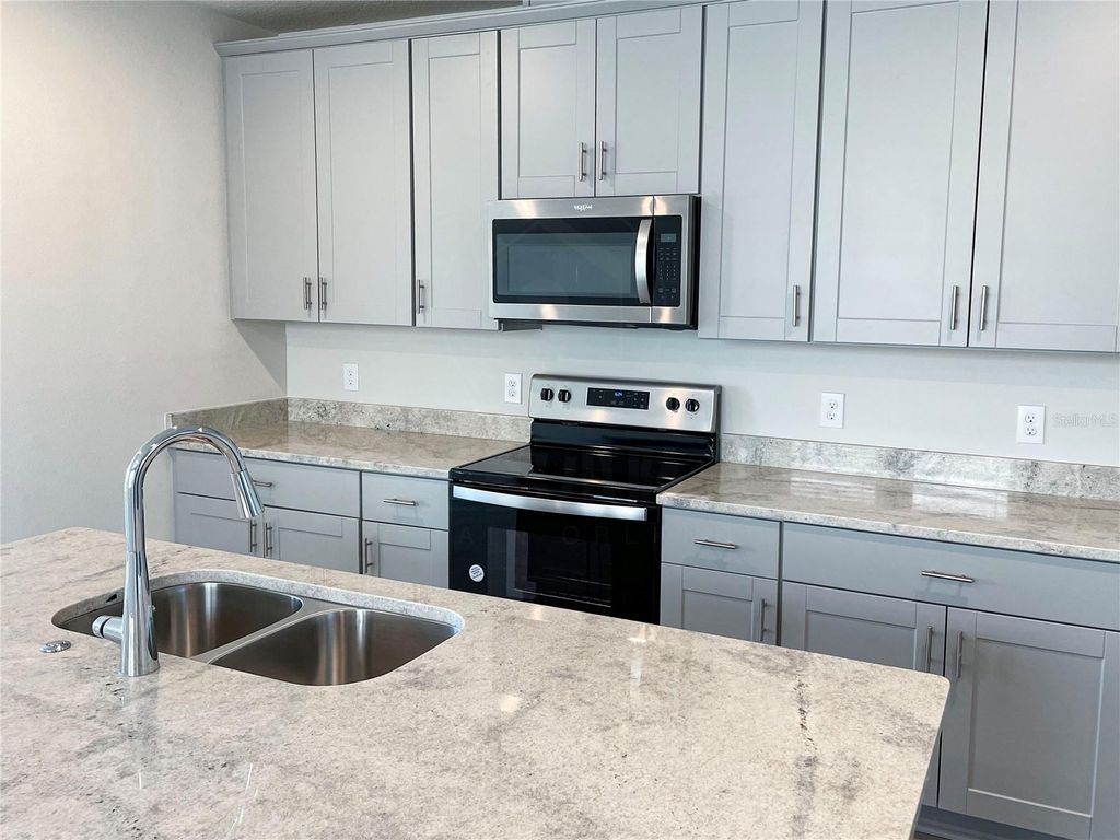 Photo of 902 Rivers Crossing Street, Clermont, FL 34714 (MLS # O6299461)