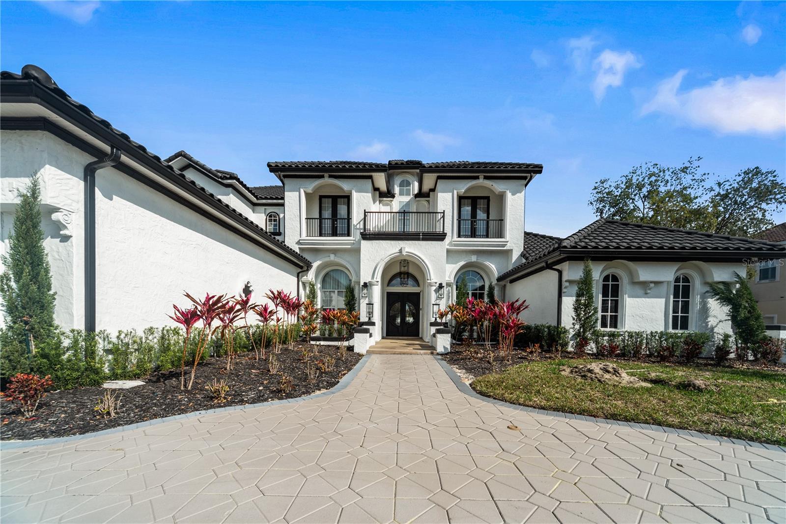 Could This Be Your Perfect Windermere Home?
This stunning Harbor Isle estate checks ALL the boxes for luxury living!
-6 Beds | 6 Baths | 6,600 Sq. Ft. – Space, style, and sophistication
-Detached 2-Story Guest House – Perfect for in-laws, guests, or a private retreat
-Fully Renovated – Move-in ready with modern, elegant finishes
-Movie Theater – Your own private cinema experience
-Koi Pond – A serene escape in your backyard
-1-Acre Cul-de-Sac Lot – Privacy, exclusivity, and tranquility
Luxury Features & Upgrades:
Brand New 2024 Exterior Paint. Four New Carrier A/C Units (2024). Electric Fireplace for Cozy Evenings. Monogram Stove & Sub-Zero Fridge. Granite Countertops & Custom Pantry. Two Brand-New Tankless Water Heaters. Washer & Dryer with Sink. Tesla Charger. Resurfaced Pool with New Equipment (2023-2024). Under-Stairs Wine Cellar & Storage. Second-Floor Playroom with Four Bedrooms. Jack-and-Jill Bathroom Plus Additional Full Baths.
This estate has everything you’ve been looking for—and more. Don’t miss your chance to own this one-of-a-kind luxury retreat in Windermere.