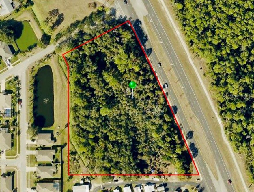 SUBJECT PROPERTY IS ~4.44 ACRE (193,538[']) SITE THAT IS ZONED B-3 COMMERCIAL WITHIN THE CITY OF EDGEWATER WITH 620 LF FRONTING S RIDGEWOOD AVENUE (US HWY 1) FOR FUTURE DEVELOPMENT ACCESS. THE PARCEL IS LOCATED IN FLOOD ZONE X AND HAS BEEN SURVEYED AS OF OCTOBER 2022. THIS COMMERCIAL SUBJECT IS WOODED WITH BOTH ELECTRIC & WATER UTILITIES AVAILABLE AT THE SITE.