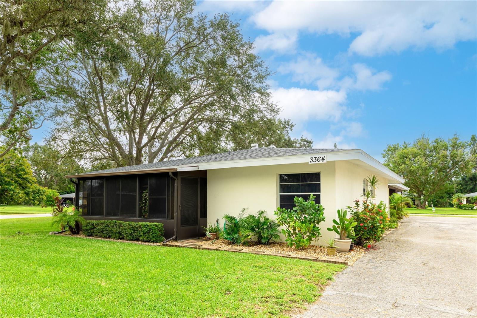 Welcome to this beautifully maintained villa in a quiet, gated Sarasota community with no age restrictions. This charming home features two fully renovated bathrooms and a modern kitchen with updated finishes and direct access to a screened-in patio—perfect for relaxing or entertaining. Enjoy peace of mind with a new roof, and take advantage of a prime location just minutes from SRQ Airport, UTC Mall, Lido Key (all within 7 miles), and Downtown Sarasota (less than 3 miles away). A perfect blend of comfort, convenience, and Florida lifestyle!