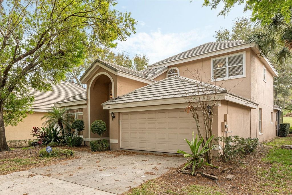 Photo of 7284 Hawksnest Boulevard, Orlando, FL 32835 (MLS # O6409466)