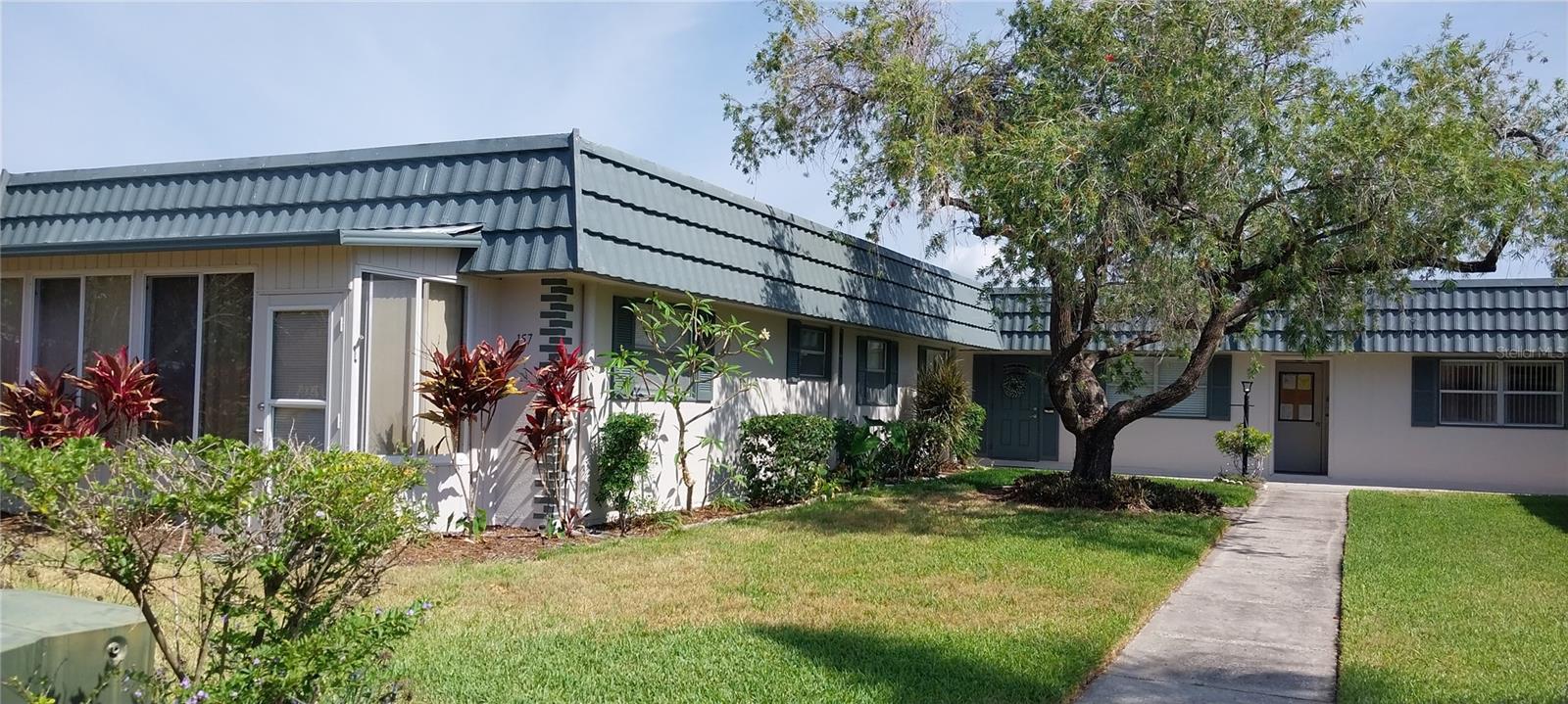 Unfurnished. Turnkey condo in desirable 55+ active community of Kings Point. This 2 bedroom, 2 bath has vinyl plank floors, recessed can lights, ceiling fans. Both bedrooms have large closets. The enclosed lanai overlooks a very pretty and spacious backyard. Home has an inside laundry room, and the washer and dryer are provided. The covered assigned parking space is conveniently located near the door. One-year lease, non-smokers only, no pets allowed. Kings Point has two clubhouses with indoor and outdoor pools, casual dining, fitness, clubs, and activities to keep you as busy as you choose to be. The community is near the West coast of Florida with a short drive to beaches, parks, cultural centers, professional sports teams, airports, dining, shopping, medical and more. Rent Includes: Water, Sewer, Garbage, Lawn Maintenance, Clubhouse Dues for two, Basic Cable TV, Internet, and Pest Control. One occupant must be 55 years or older.