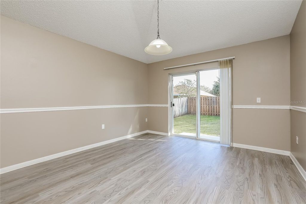 Photo of 977 Vanderbilt Drive, Eustis, FL 32726 (MLS # O6363688)