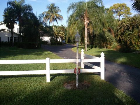 Photo of 137 Caribbean Road, Naples, FL 34108 (MLS # TB8428972)