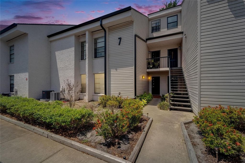 Photo of 4709 Puritan Circle #702, Tampa, FL 33617 (MLS # TB8378367)