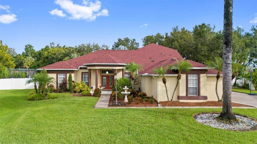 One or more photo(s) has been virtually staged. **This home qualifies for a limited-time lender-paid 2-1 buydown— reduced monthly payments for the first 2 years at no cost to the buyer or seller. Ask listing agent for details**

Move-In Ready Pool Home on Over 1/2 Acre – Zoned for Top-Rated K-12 Schools in Prime Central Florida Location

Welcome to this beautifully maintained 4-bedroom, 3.5-bathroom pool home situated on a quiet street in a well-kept HOA community. Set on over half an acre, this property offers privacy, space, and smart home upgrades—perfect for families or anyone looking for modern convenience and outdoor living.

Enjoy a split-bedroom floor plan designed for comfort and function. The spacious primary suite features a fully remodeled ensuite bath (2023) with a whirlpool soaking tub, walk-in shower, marble double vanity, and walk-in closet. Two additional bedrooms share a fully updated hall bathroom (2025) and are positioned near the indoor laundry room, which includes a new smart washer and dryer.

The kitchen is a chef’s dream, with granite countertops, wood cabinetry, pantry, and Wi-Fi-enabled smart appliances, including a wall oven with air-fry function, double-drawer dishwasher, and smart refrigerator. Adjacent to the kitchen is a bright breakfast nook with backyard views, and a spacious living area featuring a gas fireplace.

Upstairs, a large guest suite with private full bathroom (2025) is ideal for visitors or extended family. A versatile bonus room provides the perfect space for a home office, movie room, playroom, or gym.

Step into your private backyard oasis featuring a 25,000-gallon screened-in pool, resurfaced in 2016 and updated with smart-controlled equipment. The outdoor space includes a retractable patio screen, outdoor shower, and convenient half bath for poolside guests. The fully fenced backyard backs up to a protected easement, offering no rear neighbors and plenty of privacy.

Twin Lakes has a 12-acre park with swings and playground equipment, community pool, 1-mile walking loop, tennis & basketball courts as part of the HOA amenities. Conveniently located to shopping, restaurants, I4, I75 & the Salmon Expressway for easy commuting to downtown Tampa and MacDill AFB.

Schedule your private showing today. Homes like this—with smart features, pool, space, and top-rated schools—don’t come around often!
