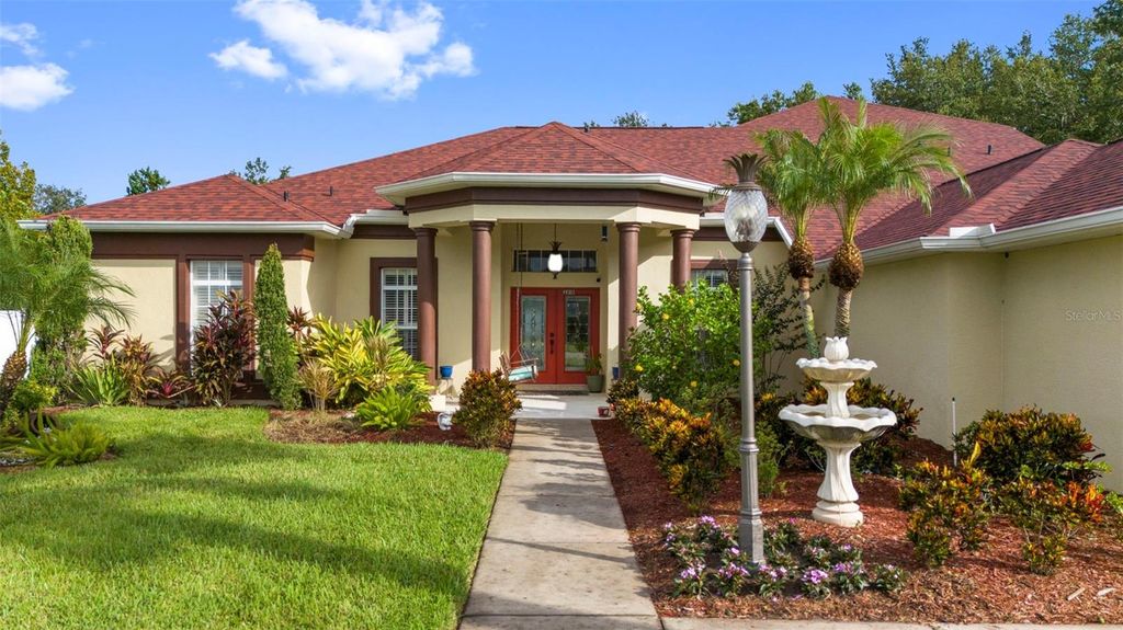 Photo of 2818 Mossy Timber Trail, Valrico, FL 33596 (MLS # O6340016)