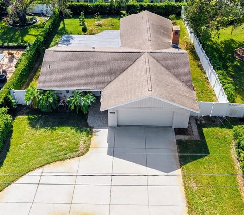 A home in BELLEAIR BLUFFS