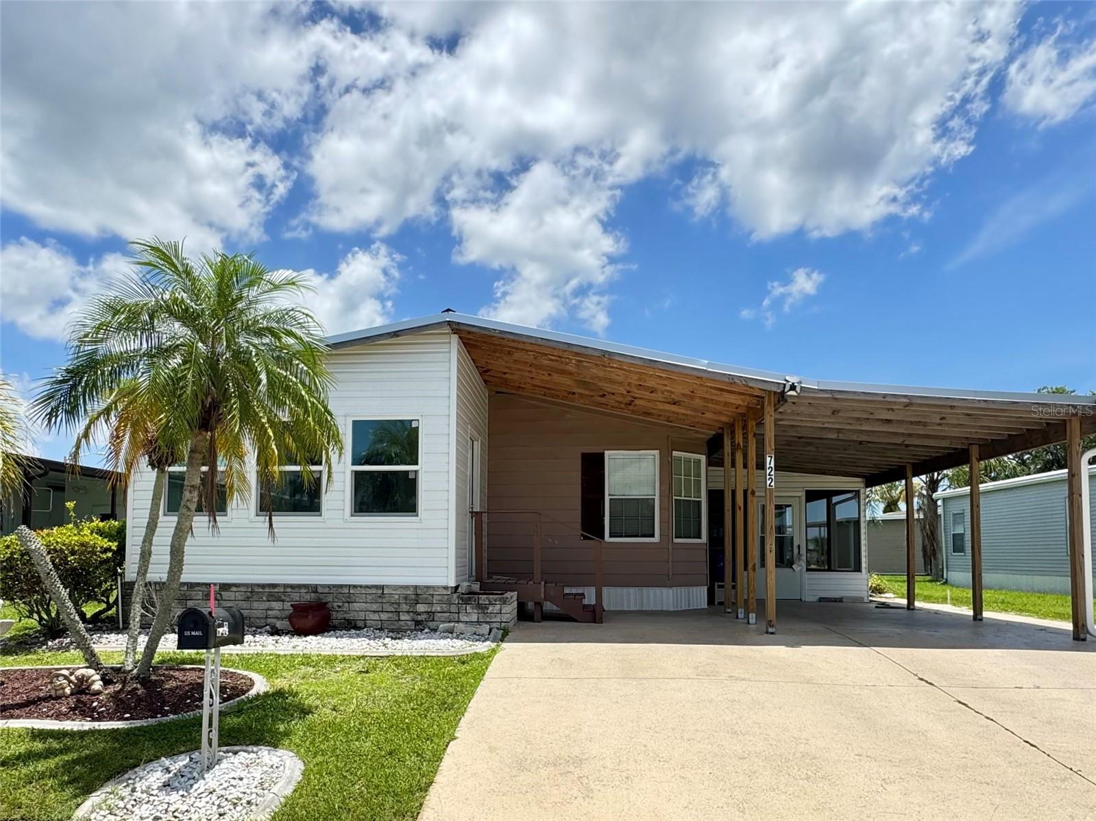 Experience the best of Florida’s retirement lifestyle; Harbor Cove, a sought-after 55+ waterfront community along the scenic Myakka River, filled with resort-style amenities. This dazzling home features a new roof (2023) with a 15-year leak guarantee, new air conditioner (2024) with a 10-year extended Service plan for parts and labor transferable to the new owner, new insulated Florida room, new carport, and a new shed. Move right in and live worry-free! 4-point inspection report available upon request.
The heart of this home is this spacious kitchen, perfect for both everyday living and entertaining. You’ll love the abundance of cabinet space, ideal for storing all your cooking essentials and more. A generous breakfast bar provides additional seating and a great spot for casual meals or chatting with guests while you cook. The bright eat-in area offers the perfect space for family dining or morning coffee, making this kitchen as functional as it is inviting. Retreat to the large master suite—your own private haven designed for comfort and relaxation. This generously sized bedroom offers ample room for a king-sized bed, a sitting area, and a reading nook. Enjoy the luxury of a large walk-in closet providing plenty of space for your wardrobe and more. The en suite bathroom completes the space with dual vanities and a walk-in shower. Step into the newly enclosed Florida room—an ideal space to relax and unwind year-round. This versatile area offers the perfect spot for morning coffee, reading, or entertaining guests. Whether you’re enjoying peaceful views or creating an indoor-outdoor living experience, this beautifully updated Florida room adds valuable square footage and charm to your home. Enjoy the convenience of an in-home laundry setup with a dedicated space for a full-size washer and dryer. Located inside the home for easy access, this setup adds everyday comfort and efficiency to your lifestyle.
Low monthly HOA fee of just $150 a month! Includes access to two sparkling heated pools, a relaxing spa, a well-equipped fitness center, a clubhouse overlooking the stunning marina, shuffleboard, horseshoes, pickleball, tennis, and bocce courts. Socialize and stay active with dances, parties, water aerobics, fitness classes, art classes, woodworking, golf cart parades, bingo, dances, and more. Boat clubs, a craft room, picnics on the patio, golf clubs, bowling clubs and much more. There is plenty of wildlife to enjoy in this 190-acre community; herons, egrets, cranes, ibis, parrots, even alligators and manatees! Conveniently located within minutes of Downtown Wellen Park, Costco, shopping, restaurants, and a short drive to beautiful Gulf Beaches. Schedule a viewing today and let this dream home become your reality!
