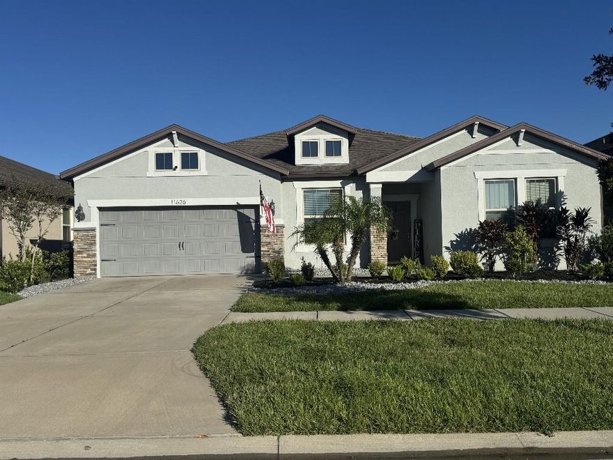 In the heart of South Fork III, this beautifully maintained 2018 home offers the perfect blend of space, warmth, and modern comfort. With 3 bedrooms, 2.5 baths, and a flexible bonus room, it is designed for both relaxation and everyday living. The open floor plan flows through tile-lined spaces into a bright living area where a three-panel pocket sliding door opens fully to an extended screened lanai. Evening light fills the home as sunsets paint the sky, creating a calm and inviting atmosphere.
The kitchen features quartz countertops, a deep farmhouse sink, new appliances, a separate wall oven and cooktop, and a sunny breakfast nook overlooking the backyard. The primary suite includes an extended layout with his-and-hers vanities and a spacious walk-in closet. A 3-car garage, mudroom, and laundry room add convenience and storage.
Outside, enjoy low-maintenance salt and pepper granite landscaping, a backyard with perfect space for a future fire pit where friends can gather under the evening glow, and neighbors who make the community feel like family. This home is turnkey, located on a quiet street, and neighbors who make the community feel like family and ready for its next owner to begin a new chapter.