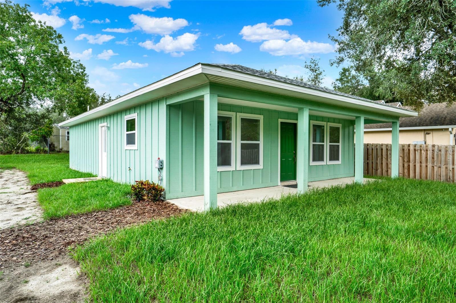Welcome to this brand-new 3 bedroom, 2 bathroom home in the quiet community of Carlton Village, Conveniently located in the outskirts of Lady Lake — offering no HOA and the freedom to enjoy your property your way. Thoughtfully designed with over 1,200 sq. ft. of living space plus an inviting 180 sq. ft. covered front porch, this home is perfect for a first-time buyer or someone looking to retire in comfort.
Step inside to a bright, open floor plan featuring a beautiful kitchen with a large island and bar seating—perfect for entertaining or everyday living. You’ll also find upgraded padding in the bedrooms, a walk-in closet in the primary suite, and an upgraded guest bathroom with a modern shower and vanity. Natural light flows throughout, giving the home a warm and welcoming feel.
This home offers peace of mind with all new systems, so you can move in without worry. The spacious lot provides plenty of room to add a garage or guest suite if desired and plenty of storage space in the attic.
Conveniently located near shopping, dining, and The Villages, you’ll enjoy both privacy and accessibility.
Don’t miss your chance to own a brand-new home in a quiet, convenient location!