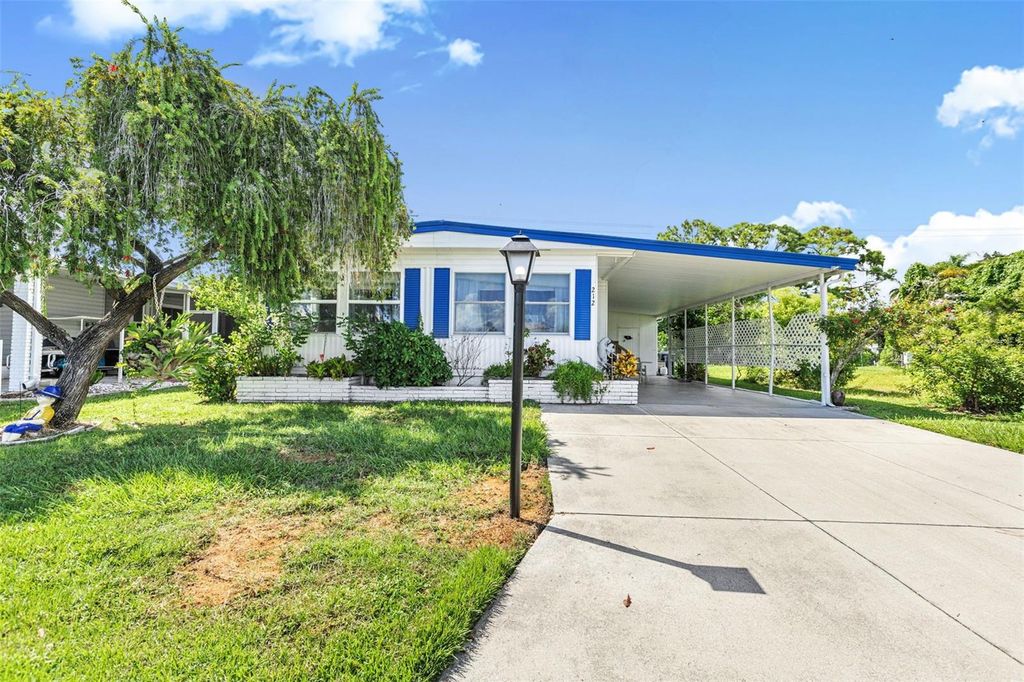 Photo of 212 La Costa, North Port, FL 34287 (MLS # TB8427670)