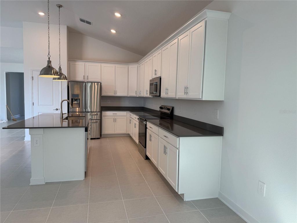 Photo of 7117 Dilly Lake Avenue, Groveland, FL 34736 (MLS # S5140906)