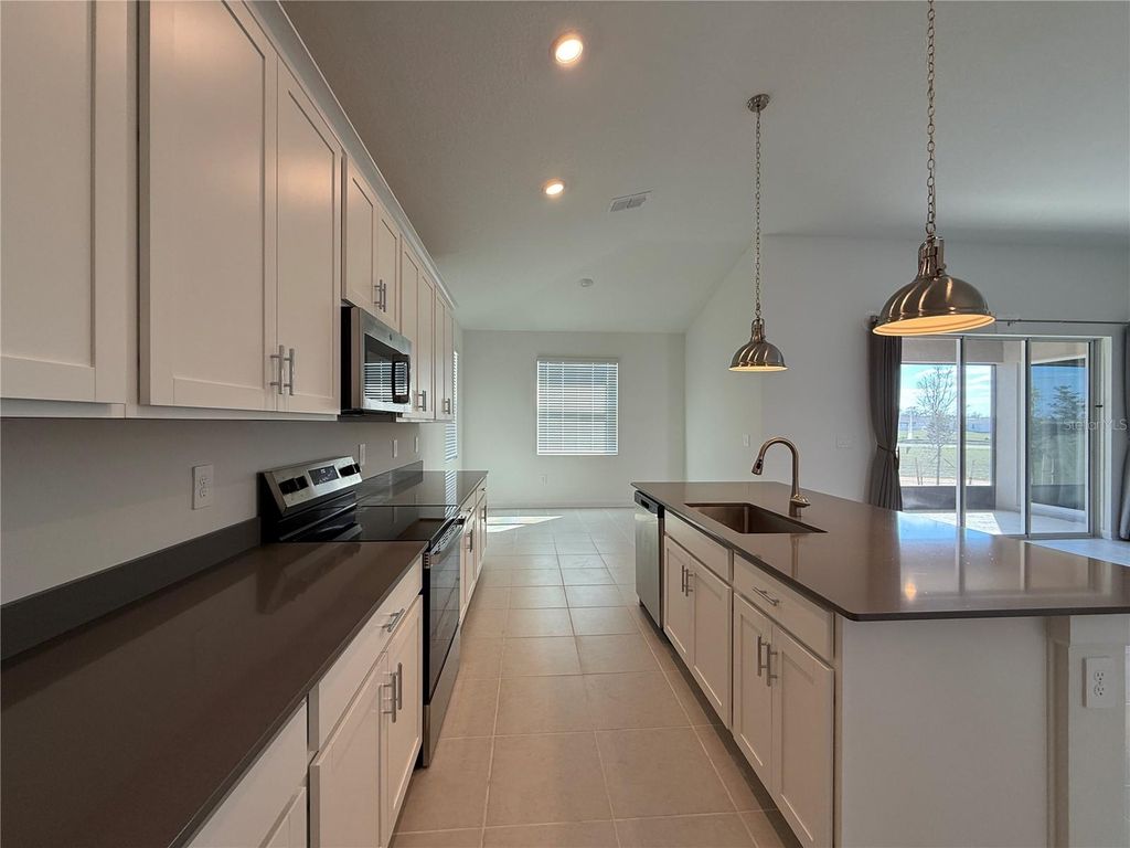 Photo of 7117 Dilly Lake Avenue, Groveland, FL 34736 (MLS # S5140906)