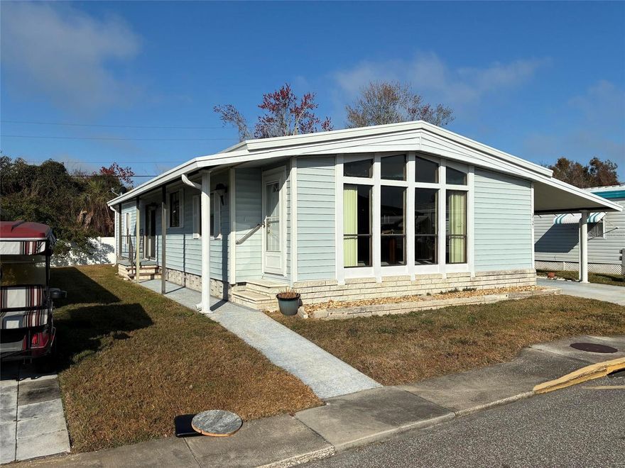 Spacious 2 bedroom, 2 bath home with Family room open to the kitchen for great entertainment plus a Cooking Island in kitchen with more seating. 
Inside Laundry is another plus, some newer flooring. Home needs some new flooring in some rooms to suit your taste. Enjoy the Year round Heated Community Pool, Shuffle Board and Very Active Clubhouse. This 55+ Community has a very low monthly maintenance fee of $143  which includes Lawn Maintenance, garbage service and YOU OWN YOUR OWN LAND!
Home needs a little TLC. 

Buyer to verify all information that is deemed to be accurate.  Sold As Is. Measurements are approx.