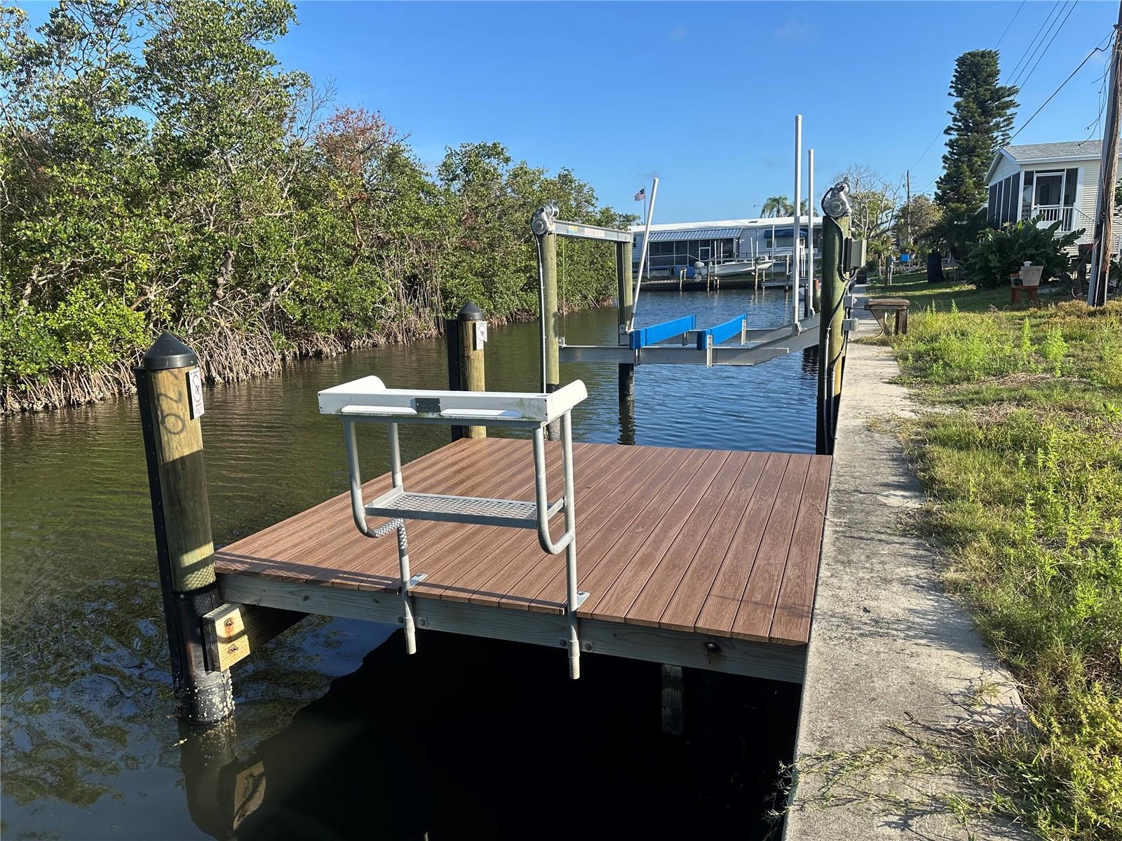 DON’T MISS THIS WATERFRONT GEM!
A rare opportunity to own a prime OVERSIZED WATERFRONT LOT in the sought-after Tropic Isles, a 55+ RESIDENT-OWNED WATERFRONT community! With 60 feet of SEAWALL and DIRECT CANAL ACCESS this property is a boater’s paradise. A BRAND-NEW 10x10 DOCK and 10,000 lb BOAT LIFT make getting on the water effortless—whether you're fishing, cruising, or simply soaking up the Florida sun.
Tropic Isles offers friendly environment, great amenities and a calendar full of activities to enjoy. Opportunities like this don’t show up everyday —secure your slice of paradise before it’s gone!