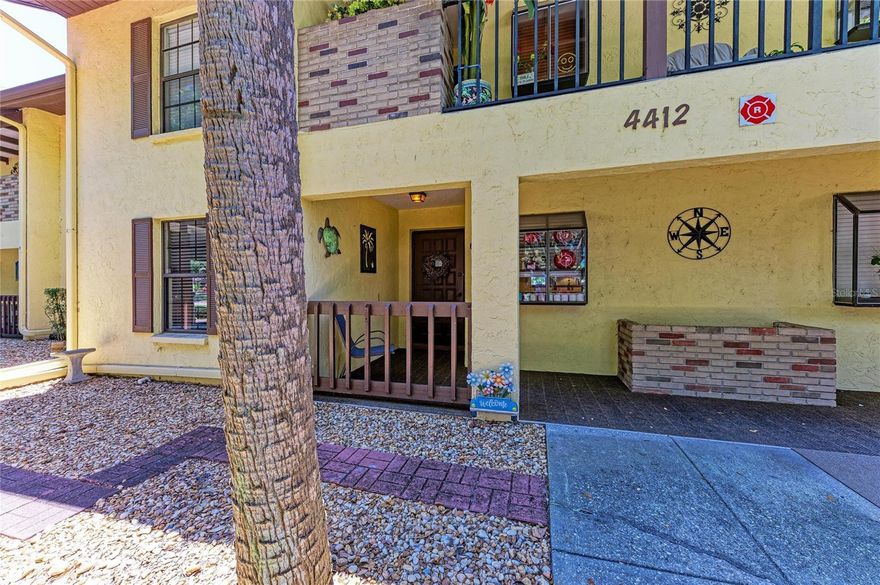This TURN-KEY FURNISHED condo has been beautifully updated.  The kitchen has lighted glass cabinets,  pull out drawers, a range with double ovens, and the raised ceiling has designer shiplap.  In the open tiled great room there is a beautiful lighted wine/beverage bar with upgraded cabinets and glassed shelving.  Both bedrooms have new luxury vinyl plank flooring and both bathrooms have new vanities.  The primary bedroom has walk-in closets.  The enclosed lanai leads out to an open pavered porch and grill area.  The roofs were redone in 2019.  This rarely available FIRST FLOOR furnished condo in Spicewood is located within the River Isles Community.  Spicewood is a separate community with mature landscaping, heated pool and a clubhouse that hosts many Friday Happy Hours and Potlucks.  River Isles Golf Club has memberships available or you can play during their open public times.  Fees here in Spicewood include outside maintenance, pest control, roof, pool maintenance, basic cable and Wi-Fi, water, sewer, and trash.  Within a block away are many restaurants and shops.  The famous Anna Maria Island beaches are only 13 miles away.  The new UTC mall area is only 5 miles away. Such a great location and such a great furnished first floor condo.