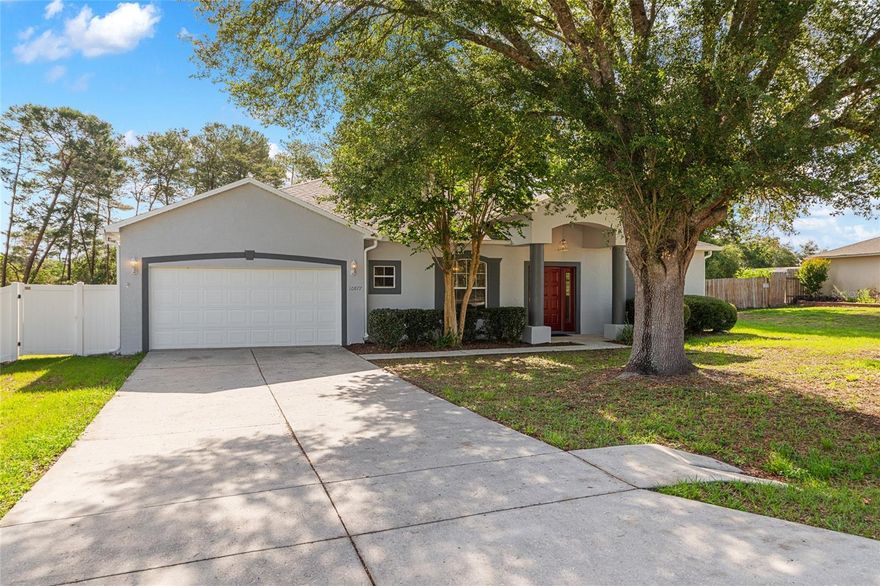 Welcome to this inviting 4-bedroom, 2-bath home located on a quiet cul-de-sac in Ocala Waterway Estates sitting on just under half an acre. Perfect for those seeking comfortable Ocala living, this residence offers thoughtful updates, functional spaces, and a peaceful setting. Beautiful LVP flooring that flows throughout the home, creating an easy-to-maintain environment. The heart of the home is the updated kitchen, featuring modern finishes, ample counter space, lighted cabinets, and a large walk-in pantry for excellent storage. Both bathrooms have been nicely updated for contemporary appeal and convenience. Primary bath features a soaking tub plus step-in shower and a beautiful double vanity cabinet. Guest bath offers a convenient step-in shower. The spacious layout includes a formal living room, family room, breakfast nook and a split bedroom layout. One guest bedroom offers the bonus of an extra closet, providing versatile storage options. You'll also appreciate the expanded laundry room, which makes everyday chores more efficient. Recent major updates provide peace of mind: Roof 2021, HVAC 2019. Outside, enjoy Florida's beautiful weather on the screened lanai, ideal for relaxing or entertaining. The fully fenced backyard offers privacy and a safe space for pets and play. The desirable cul-de-sac location means minimal traffic and a friendly neighborhood feel. This well-maintained home combines practical updates with comfortable living in a sought-after community. No HOA/CDD. Don't miss the opportunity to make it yours! The information contained in this listing was acquired from public records and seller and is deemed to be accurate. However, neither Ivania Bosch nor Berkshire Hathaway HS Florida Realty make any guarantees as to the accuracy of the information. Buyer and Buyer's agent to verify information.
