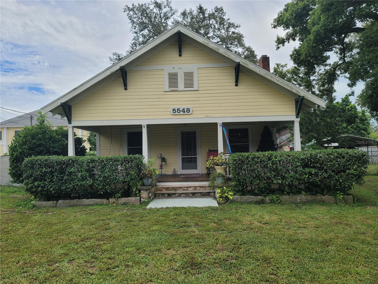 1925 Craftsman on a Half Acre MOL. Effective Year Built 1961. Wood Floors, Metal Roof, Window Seat in Dining Rm, Freestanding Wood Fireplace, Claw Foot Tub. Storage
Sheds, Newer Above ground pool. Huge Frt Covered Patio 28 Ft X 09 Ft. Landscaped Huge Yard. Room For Rv/ Boat. Back Deck . Plenty of Room to Ad Large Garage Or Whatever You want Great for Airbnb. Great Location in Historic Elfers No Flood Zone ( X ) High & Dry