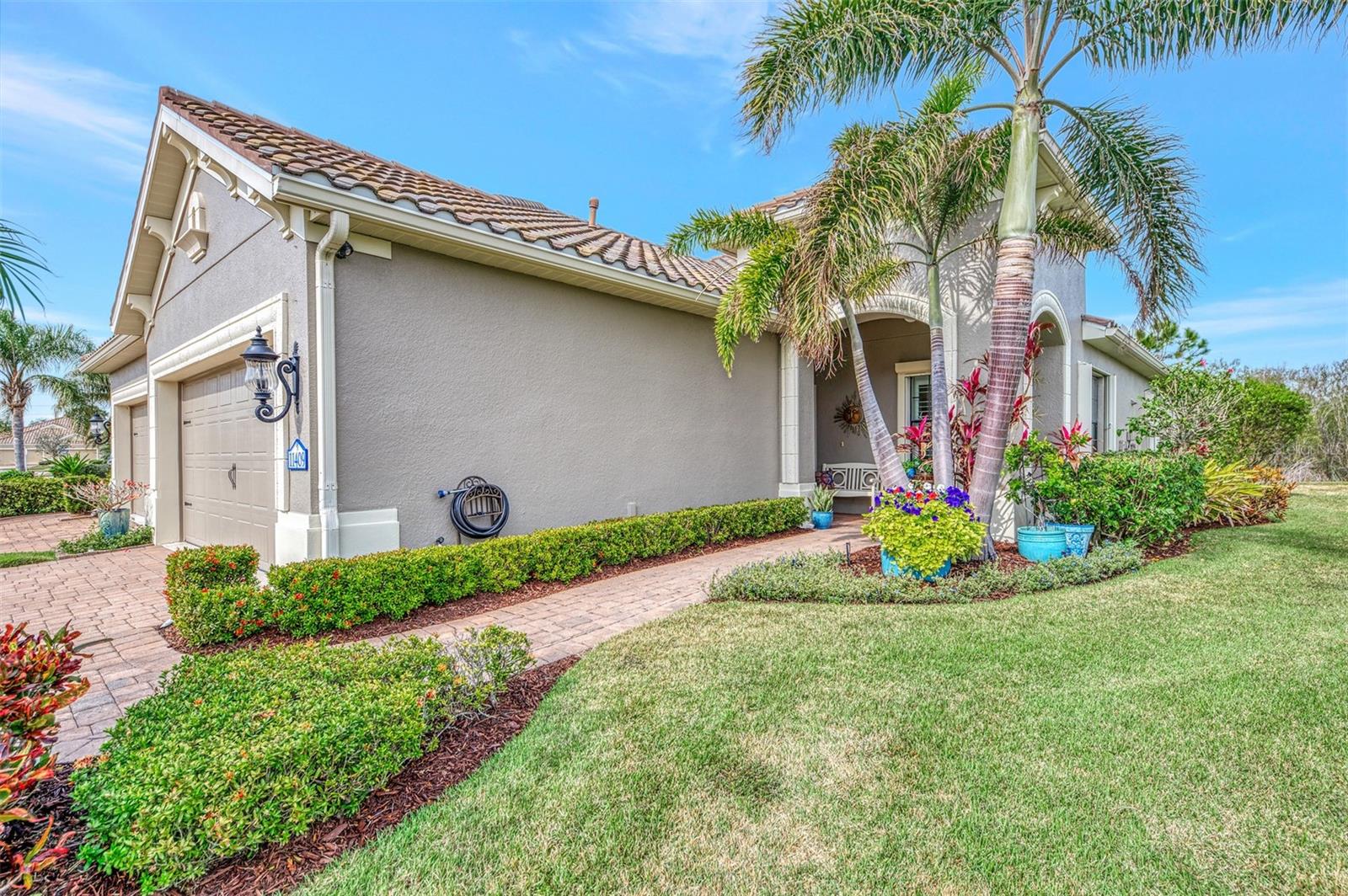 Unforgettable Move-In Ready Villa with Countless Upgrades!! Nestled in the sought-after Grand Palm Community, this meticulously upgraded 2 BDRM, 2 BA home with Study/Den that can also be used for additional guests adds comfort and functionality in a serene resort-style setting! Inside, you’ll find modern upgrades including a new shower and vanity countertops in the guest bathroom, improved shower design in primary bathroom, custom privacy accordion shades for both guest and primary bathroom suites, Rev-A-Shelf cabinet organizers in the kitchen and primary bathroom, custom kitchen pantry, upgraded kitchen appliances, vented microwave range hood, enlarged kitchen island with new countertop, plantation shutters, new A/C in 2018, new water heater in 2024, hurricane shutters for entire villa, custom privacy accordion lanai shade, and so much more! Enjoy your quiet peaceful evenings on the extended lanai with added paver patio while enjoying the tranquil backyard with a preserve setting on a larger lot! This section of Grand Palm has their own community pool, hot tub and outdoor BBQ grill available only to residents living within. Grand Palm is an amenity-rich community with an abundance of activities to keep you busy with 26+ miles of walking/biking paths, tennis, pickleball, a fitness center, three additional community pools, splash pad, dog parks and a full-time activity coordinator. Just a short drive to beautiful Gulf Beaches, Historic Downtown Venice, Vibrant Wellen Park, the Atlanta Braves Stadium and easy access to I-75. Living the life you have earned can be more than just a dream, so schedule your private showing today!