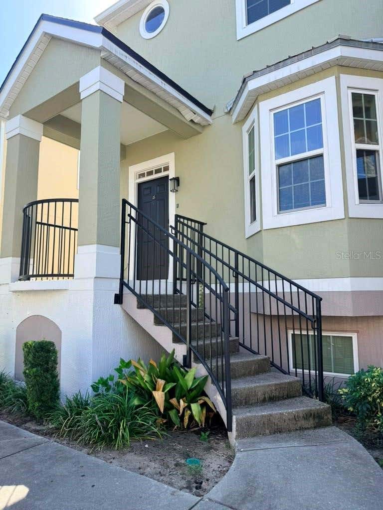 Photo of 6648 Time Square Avenue #105, Orlando, FL 32835 (MLS # O6434468)