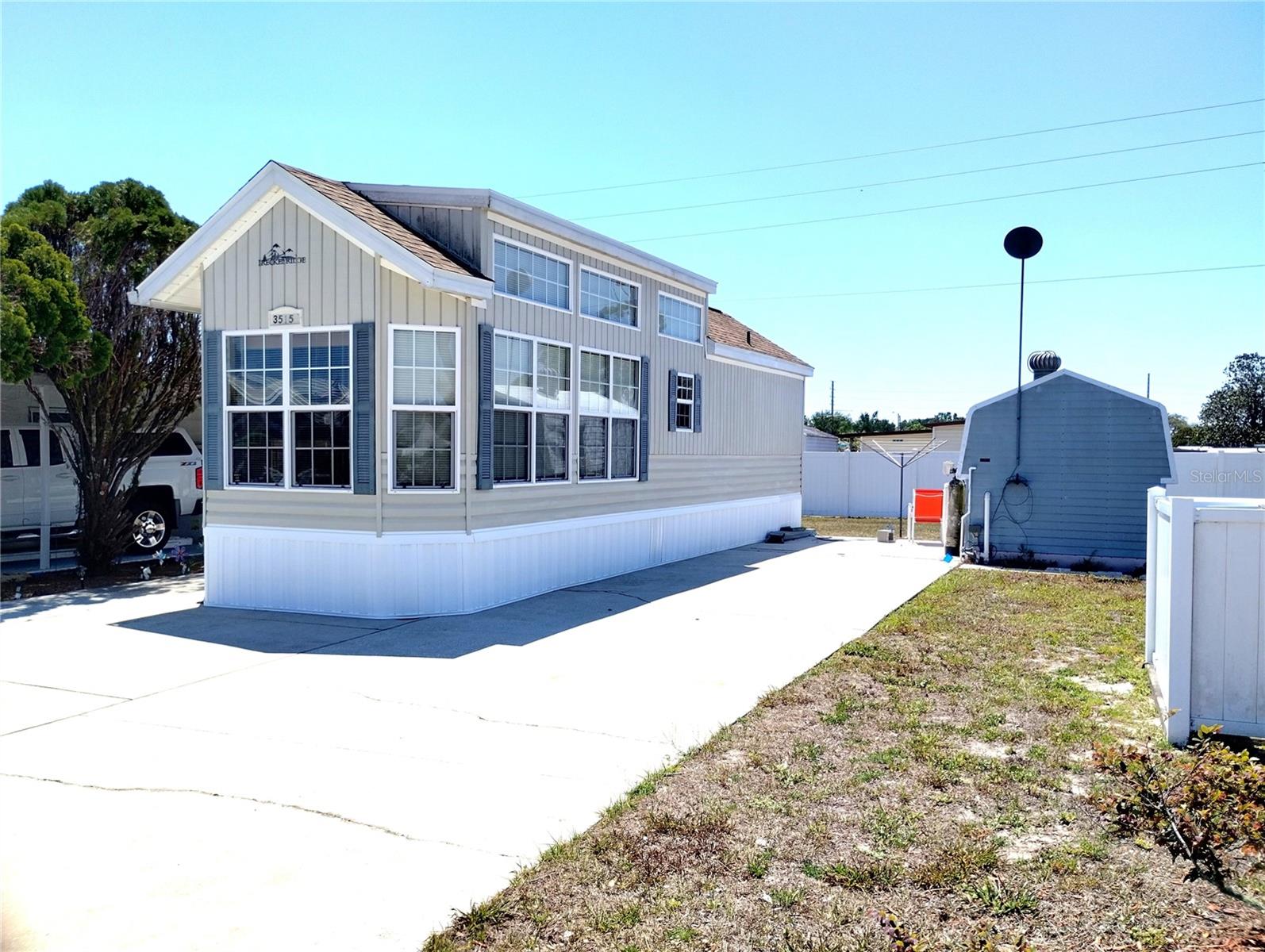 Welcome to your Deam Home in the highly desirable American Condominiums, a 55+ community! Get ready for fun, relaxation, and endless excitement in this charming 1 bedroom 1 bath park model home! Perfectly situated on a corner lot, you'll enjoy extra space while still being right in the heart of all the action. Just steps away from an amazing line up of amenities! Shuffleboard/Tennis courts/Sparkling Pool/Vibrant Clubhouse/Convenient Mailboxes. This lively, welcoming neighborhood offers the perfect mix of comfort and social connection! Whether you love cruising on a golf cart or biking around the neighborhood to explore, you'll feel right at home. Don't miss out - This incredible home and thriving community are with for you! Call today!