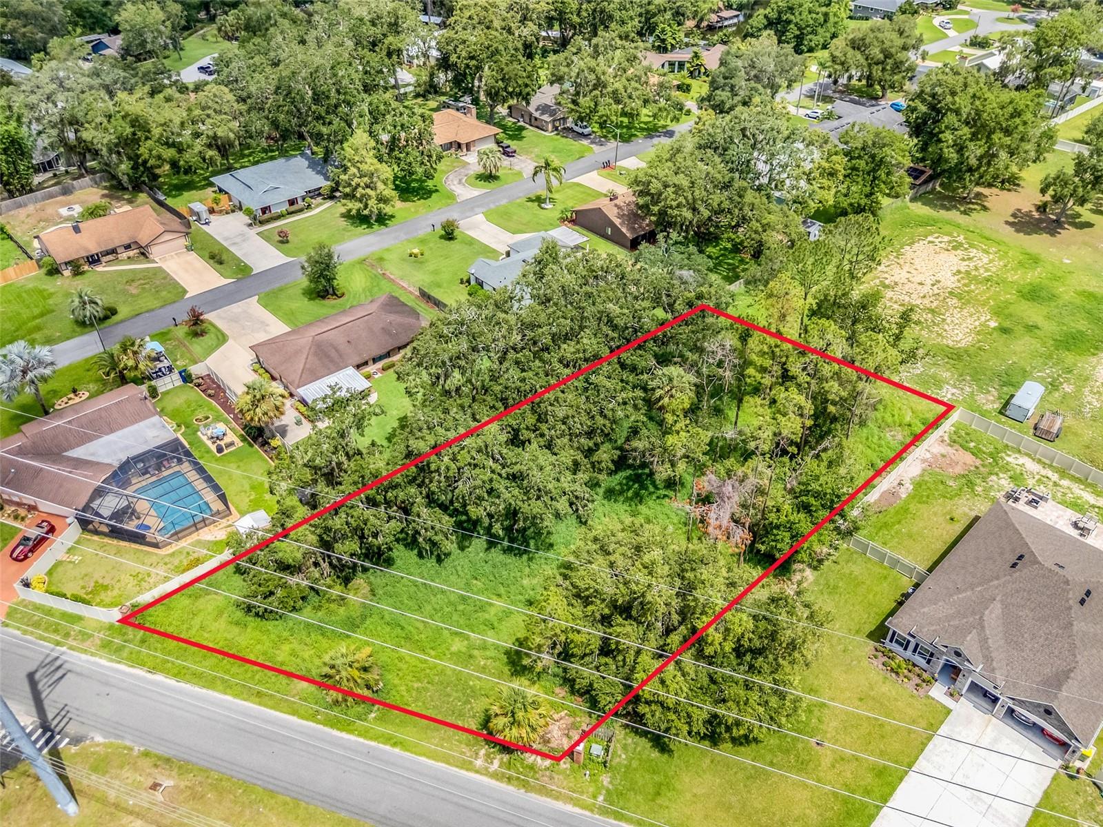 Mostly level, wooded vacant lot ready for you. Discover the potential of this beautiful 0.69-acre property nestled peacefully in Leesburg, Florida. With ample space to build a custom home, this parcel offers the perfect mix of rural charm and convenient access to town amenities. Whether you're a homeowner looking to create a private oasis, a builder searching for your next project site or an investor seeking long-term value in central Florida, this lot delivers on all fronts.