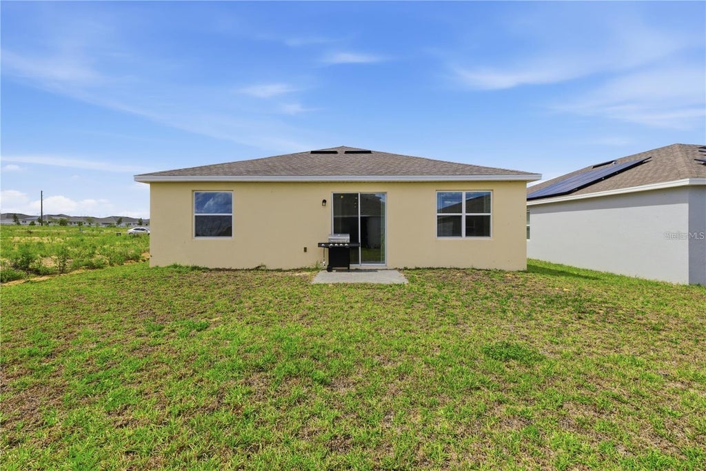 Photo of 740 Richmond Estate Avenue, Haines City, FL 33844 (MLS # S5159505)