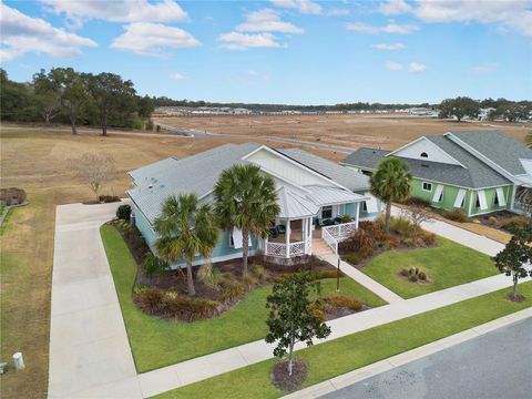 Photo of 1097 Sugar Loaf Key Loop, Lady Lake, FL 32159 (MLS # G5108248)
