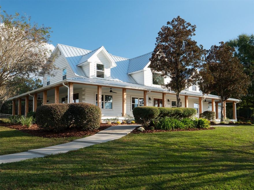 This 82 acre jem will capture your heart and inspire your imagination from the moment you arrive. Rolling green pastures and Grandaddy Oaks surround this fully renovated modern farmhouse. Professionally designed, custom cabinetry, quartz countertops as well as Viking appliances appoint this comfortable home. 
From the wrap around porch, you can enjoy a sunset or take in the wildlife that calls this property home. 
A 2 acre fully stocked spring-fed pond, teaming with trophy large mouth bass or huge blue gill, is a short walk from the porch. The property offers a 10-stall barn, which features a 3-bay garage, and workshop.  Its centrally located; Ocala, Gainesville, as well as the quaint towns of McIntosh and Micanopy, are just minutes away.  The renowned World Equestrian Center is 23 minutes away, and the new WEC at Ocala Jockey Club is literally at your back door!!  This meticulously maintained, and beautifully landscaped farm, is sure to bring you years of enjoyment. Properties like this don’t come along often.