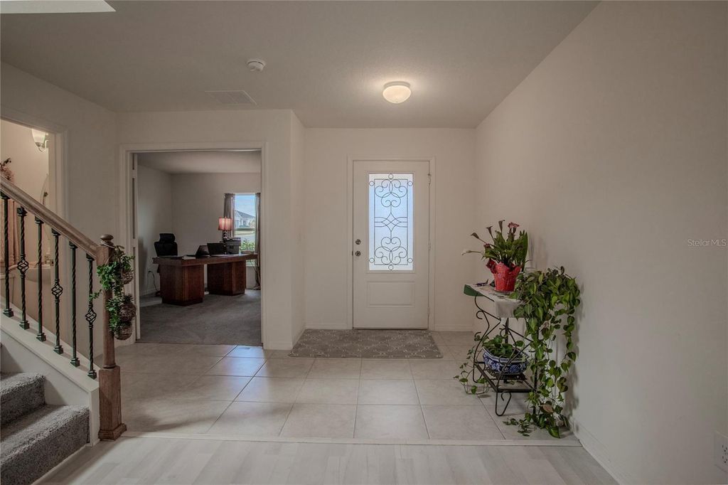 Photo of 605 Sarner Pass Way, Winter Haven, FL 33881 (MLS # G5108932)