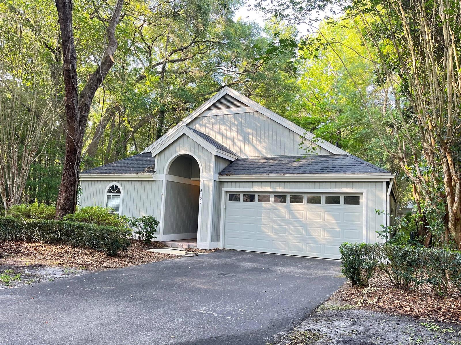 Walk to Haile Village Center! This adorable 3 bedroom and 2 bath PLUS LOFT-home offers convenience to shops, restaurants and trails! 2 car garage, screened in porch and a massive wood deck overlooking green space. New Luxury Vinyl Planks in main areas and 3rd bedroom, new carpets in Owner's suite and second bedroom, refurbished kitchen and freshly painted! Haile Plantation-Indigo Square is close to 91st St/Archer Road that will take you UF Health, University of Florida and the VA. Short drive to Celebration Pointe, Butler Plaza, I-75 corridor and zoned Wiles Elementary/Kanapaha Middle School. Great SW location!