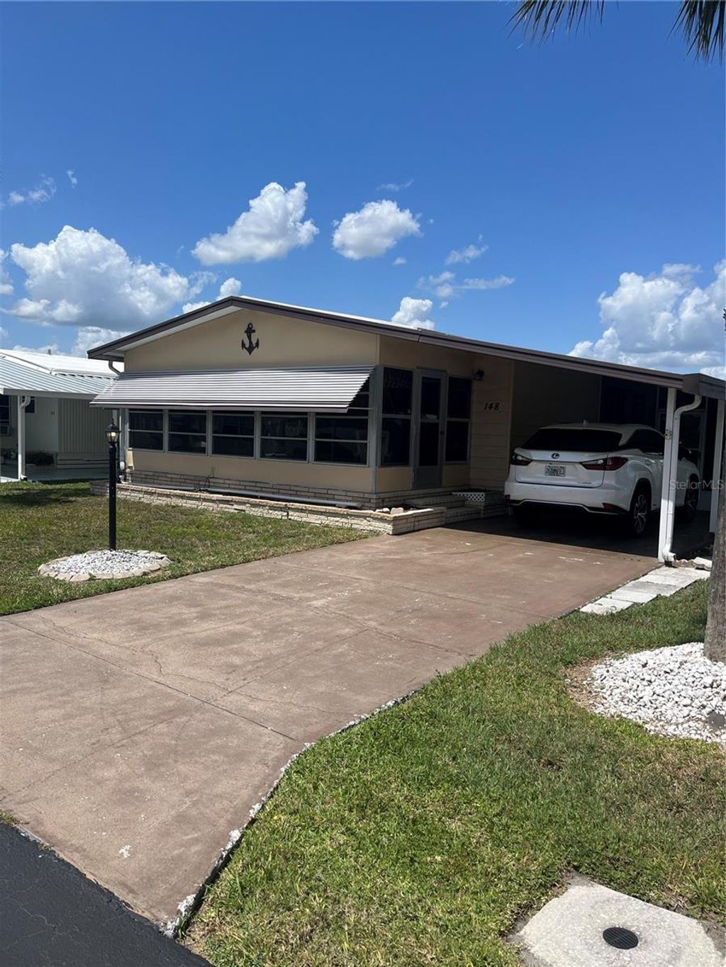 Photo of 148 Sweet Circle, Winter Haven, FL 33884 (MLS # P4934464)