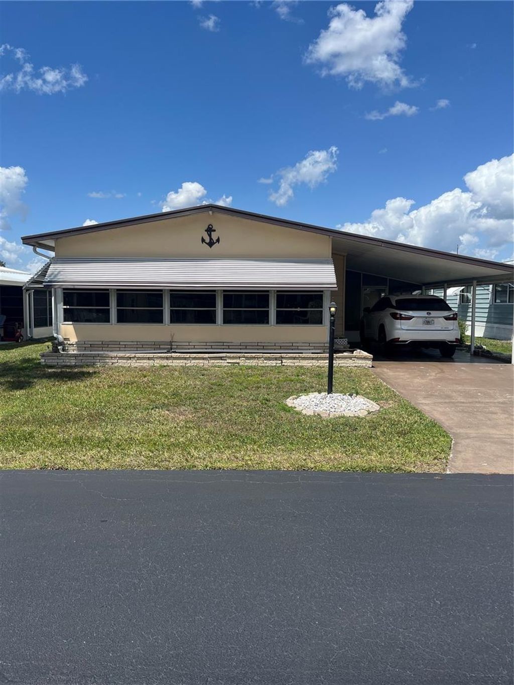 Photo of 148 Sweet Circle, Winter Haven, FL 33884 (MLS # P4934464)