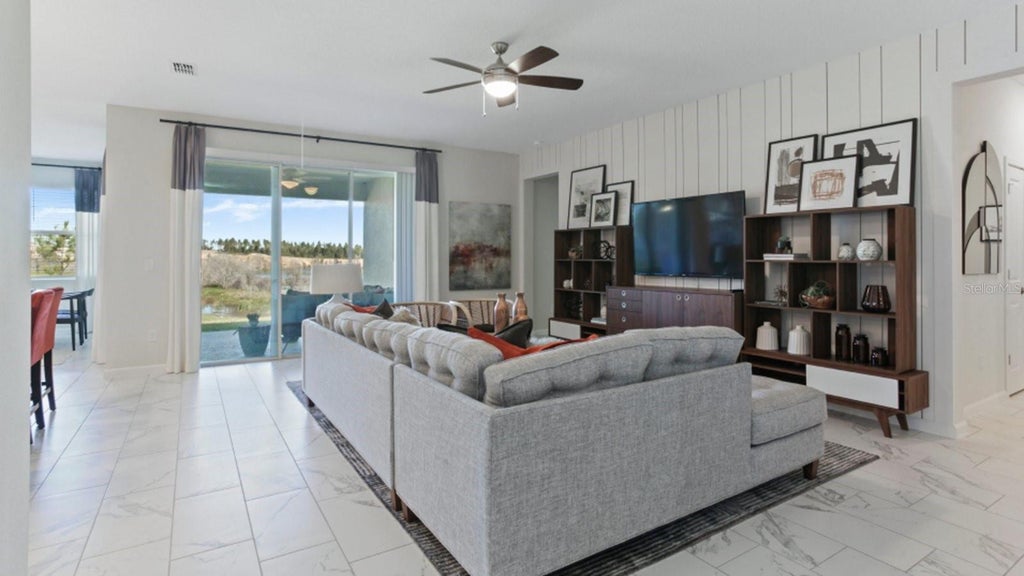 Photo of 3164 Namaste Drive, Clermont, FL 34714 (MLS # O6442319)