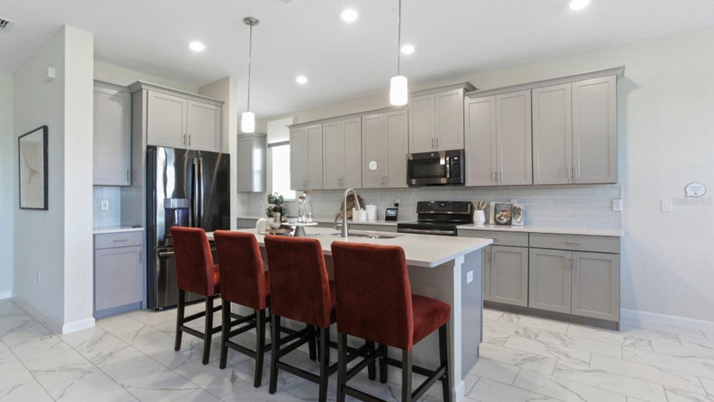 Photo of 3164 Namaste Drive, Clermont, FL 34714 (MLS # O6442319)