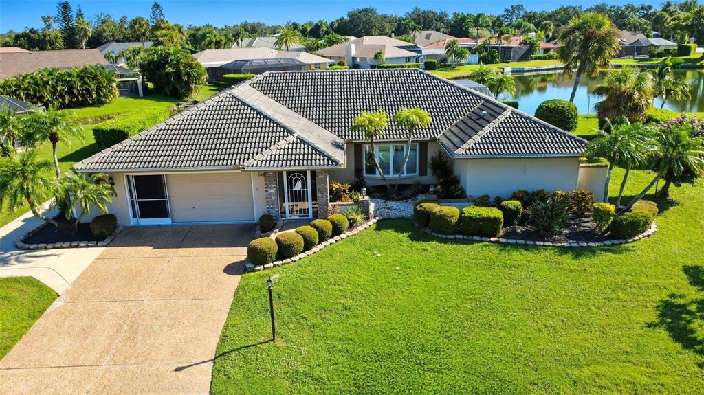Photo of 6994 Country Lakes Circle, Sarasota, FL 34243 (MLS # TB8433939)