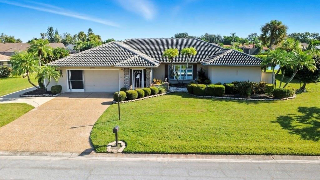 Photo of 6994 Country Lakes Circle, Sarasota, FL 34243 (MLS # TB8433939)