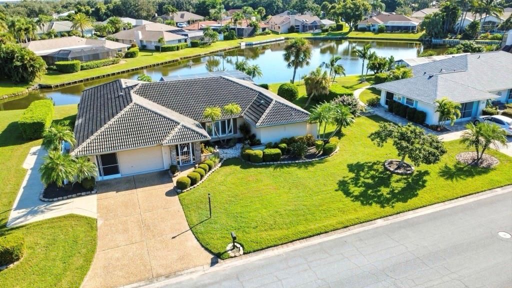 Photo of 6994 Country Lakes Circle, Sarasota, FL 34243 (MLS # TB8433939)
