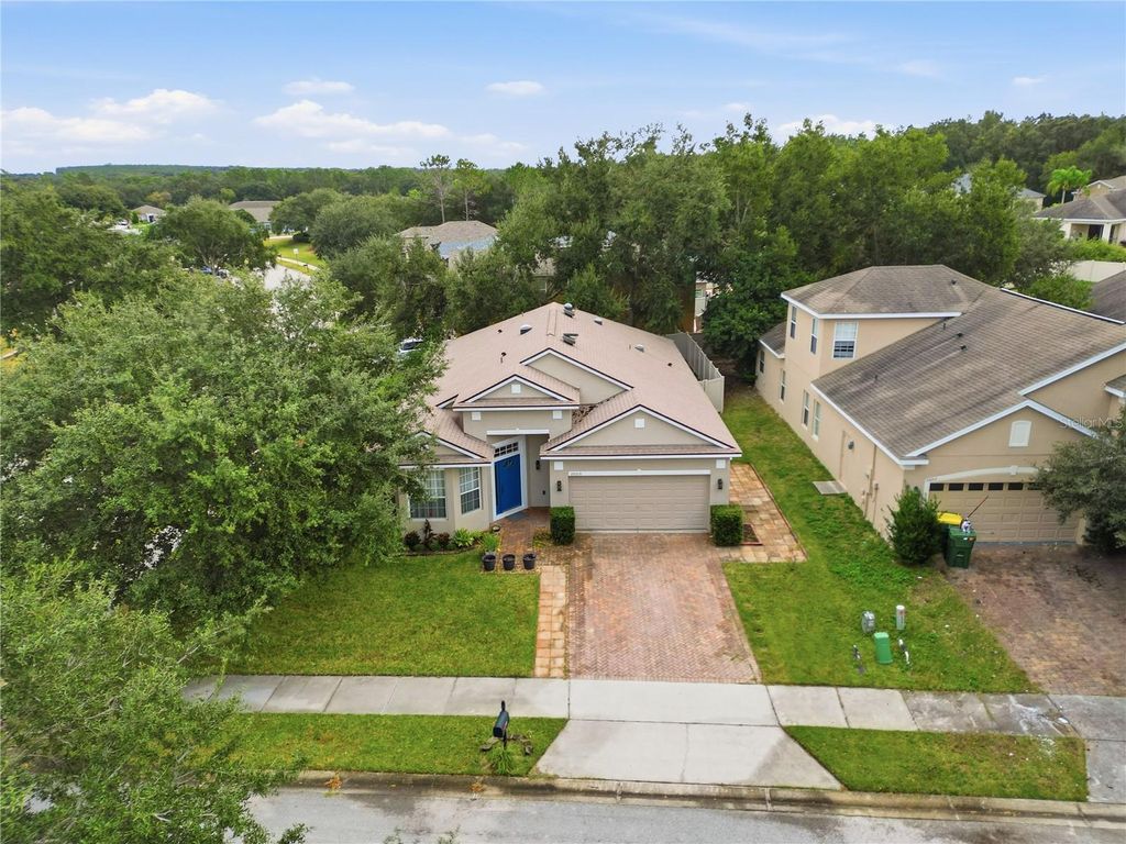 Photo of 26016 Singing Lark Court, Leesburg, FL 34748 (MLS # TB8461364)